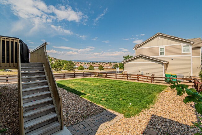 Building Photo - Spacious 5BD, 4BA Castle Rock Home with Fi...