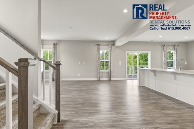 Building Photo - Great 4 bd 2.5 ba with attached garage and large deck!