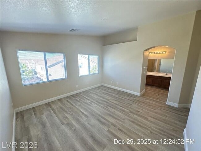 Building Photo - Cozy Gated Townhome with Private Yard, 2-Car Garage & Community Pool!