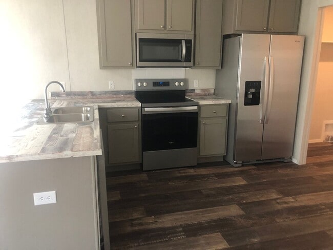 Building Photo - BRAND NEW-3 Bedroom / 2 Bath-MOVE-IN SPECI...