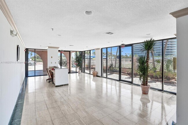 Building Photo - 8816 Collins Ave
