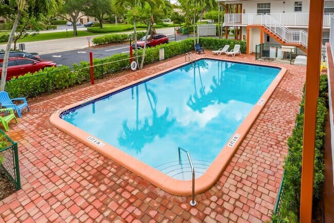 Building Photo - 3100 Coral Springs Dr