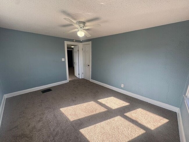 Building Photo - Charming 3BR 2BA Home w/ Fenced Yard + Covered Porch in KC