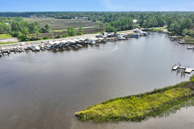 Building Photo - Welcome to Harbor Landing Condominiums — where coastal living meets convenience!