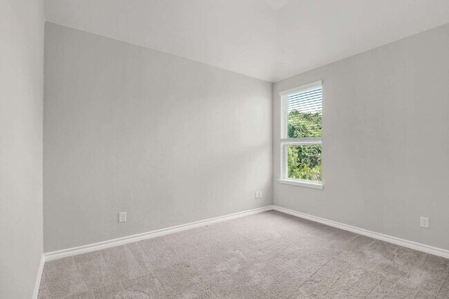 Building Photo - ASK ABOUT FREE APPLICATIONS THROUGH AUGUST!  "Spacious 4-Bedroom Sanctuary with Cozy Fireplace in...