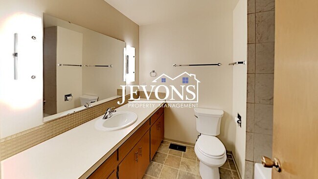Building Photo - Spacious single-family home with a large f...