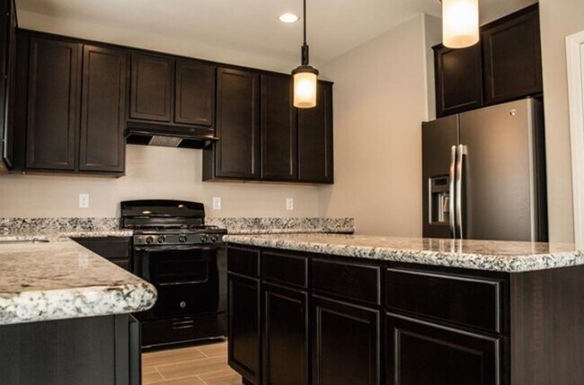 Building Photo - Beautiful 4 bedroom SW Area Home!! Corner ...