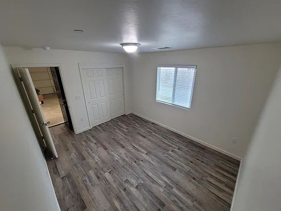 Building Photo - Freshly painted home, LVP flooring, close to schools, park, and shopping. Quiet neighborhood near...