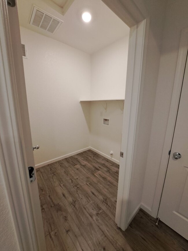 Building Photo - This Smart Home in Dixon is Luxurious with...
