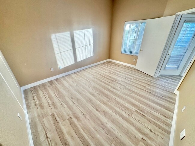 Building Photo - Welcoming 2 Bedroom home with private balcony located in South Las Vegas Community