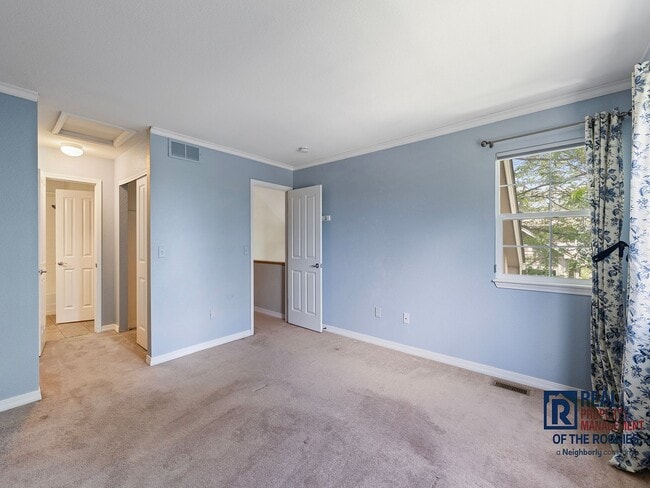 Building Photo - Fort Collins Townhouse with Vaulted Ceilin...