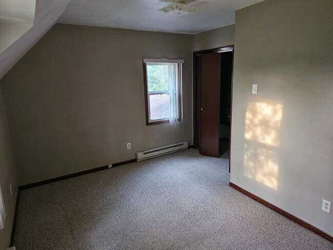 Building Photo - Spacious 3-Level Home with Garage & Off-St...