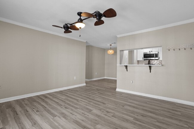 Building Photo - Welcome to Harbor Landing Condominiums — where coastal living meets convenience!