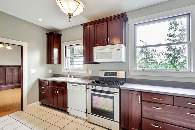 Building Photo - Perfect Blend of Piedmont Ave Energy & Tree-Lined Tranquility