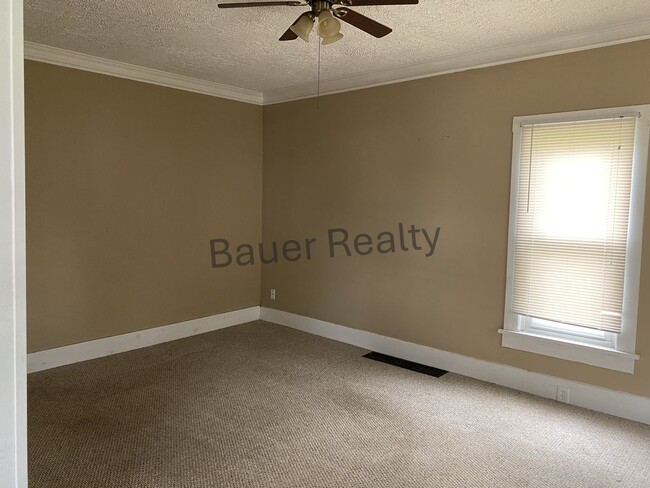 Building Photo - Three Bedrooms, One and a Half Baths