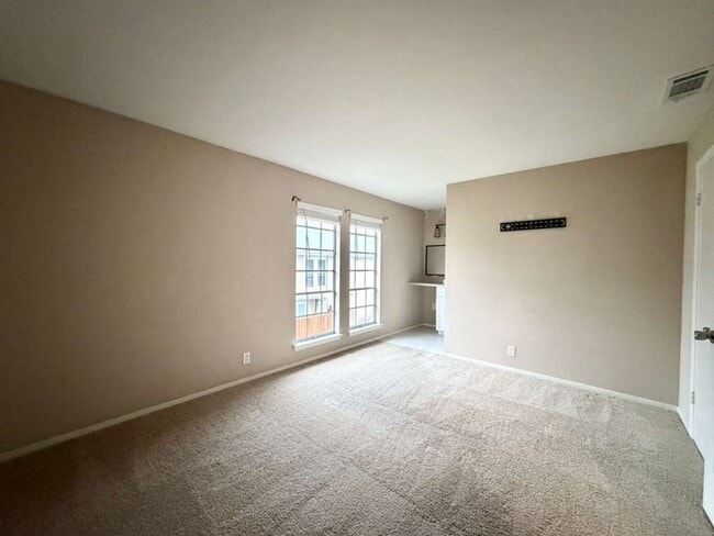 Building Photo - Modern Medical Center Gem with Stylish Upgrades & Private Patio Living