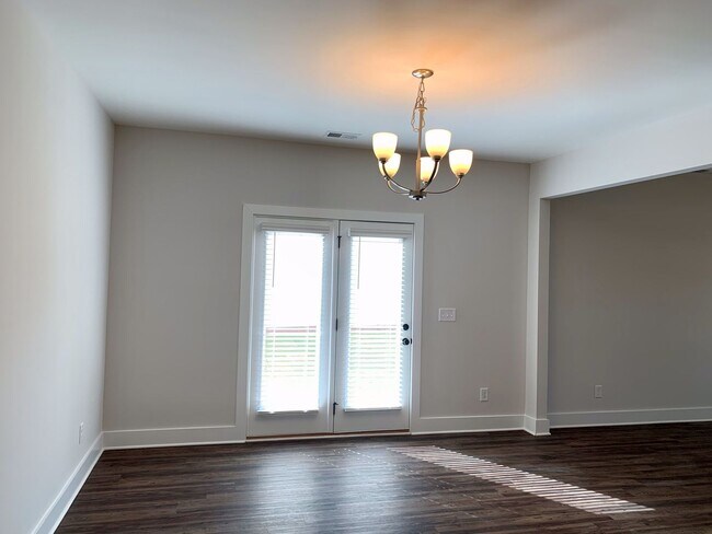 Building Photo - Spacious home with Garage and Fenced Backy...