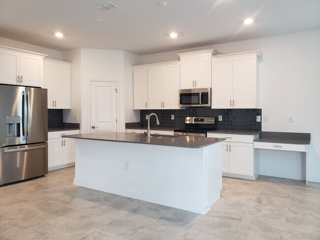 Building Photo - Bridgewalk Corner Lot Home with Wooded View and Solar Panels