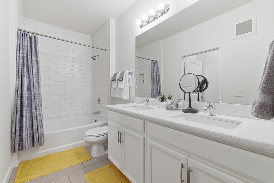 Clean, modern full bathroom with quality finishes. - 2511 W Queen Creek Rd