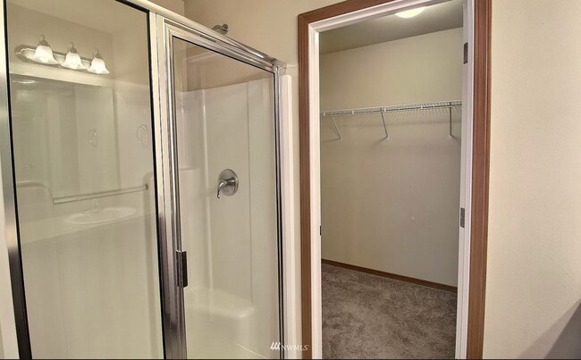 Walk in Closet inside of Master Bedroom - 596 NE Nantucket St