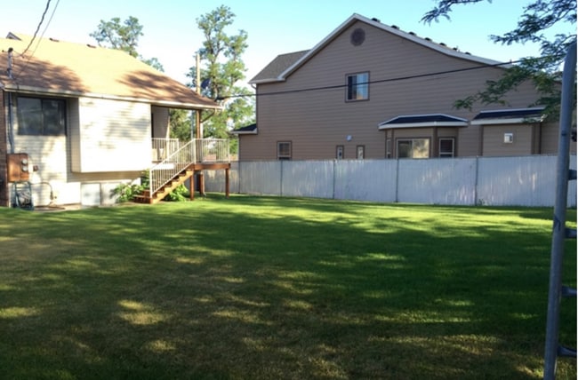 Backyard, covered deck - 1351 S Main St