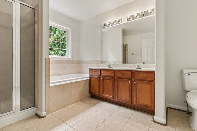 Building Photo - $2,295/Month | 3 Bed | 2.5 Bath | End-Unit Townhome in Belmont at Carmel Church | New HVAC | Wood...