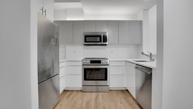 Building Photo - EPIC REA - Modern-Style 1 BR/1 BA Condo in...