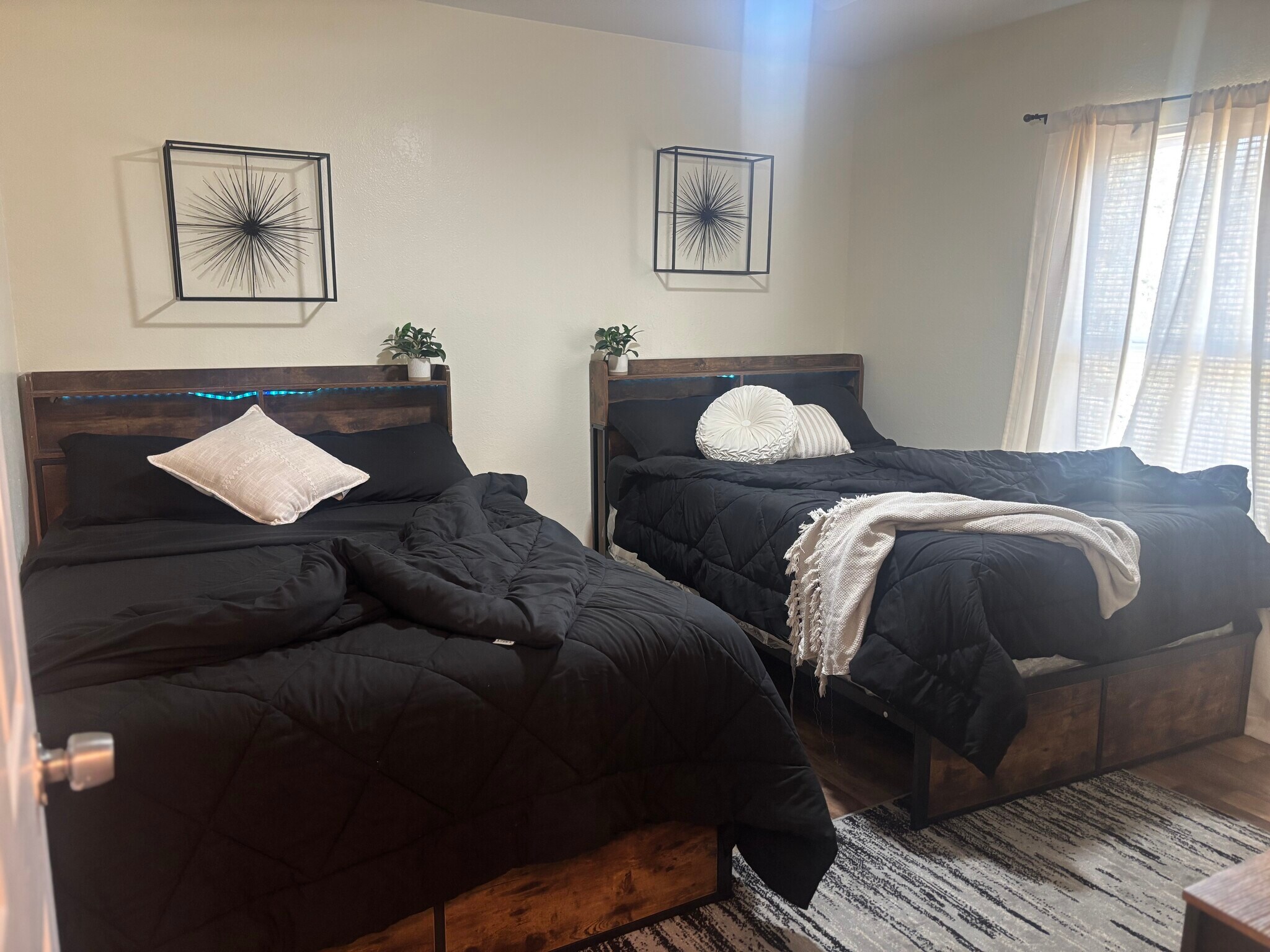 Room 1 includes two full sized beds. - 4685 Boot Hill Dr