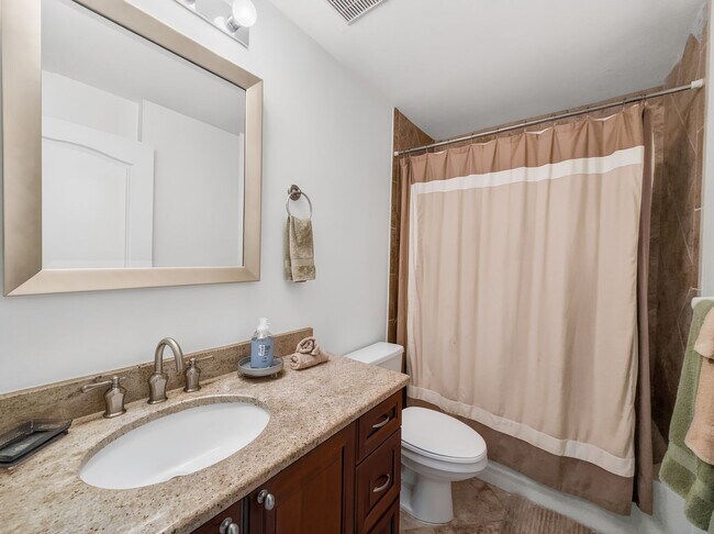 Building Photo - Beautifully furnished 2BR/2BA first-floor condo