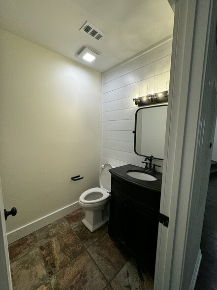 Powder room on main floor - 157 Elysian Way NW