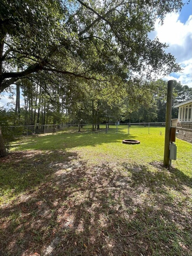 Building Photo - Immaculate 4BR Mobile Home in the heart of...