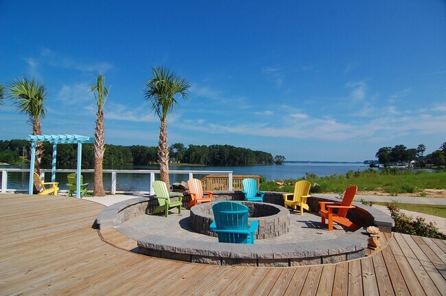 Building Photo - Partially Furnished Lakefront Retreat in Sunset Bay – Stunning Views & Resort-Style Amenities