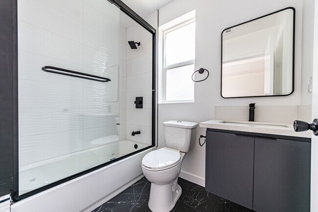 Building Photo - Sleek and spacious 4-bedroom, 4.5-bathroom...