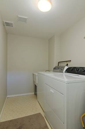 Large laundry room on the ground level (next to the Garage) - 6337 Hillman Pl NE