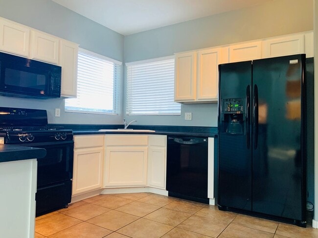 Building Photo - Rancho Sahuarita 4 bedroom 3 bath 2 story Home