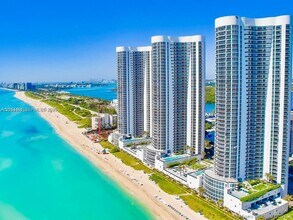 Building Photo - 15811 Collins Ave