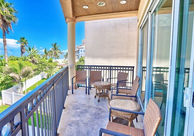 Building Photo - Gulf-Front Luxury Townhouse | 4 Bedrooms + Loft | Sleeps 17 | Game Room & Elevator