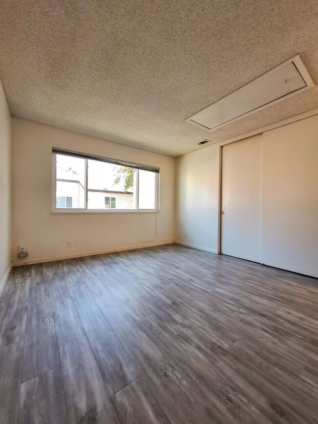 Building Photo - Spacious Two-Story 3bd Townhouse With Private Patios, Balcony, & Garage