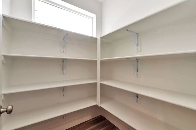 Building Photo - Modern End Unit townhouse w attached 2 car...