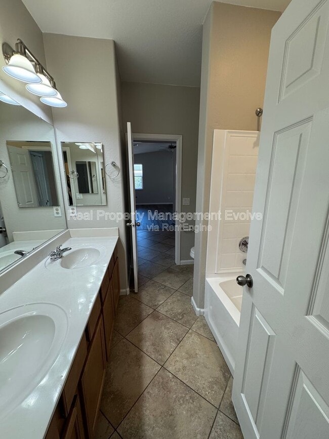 Building Photo - 13014 W Lamar Rd