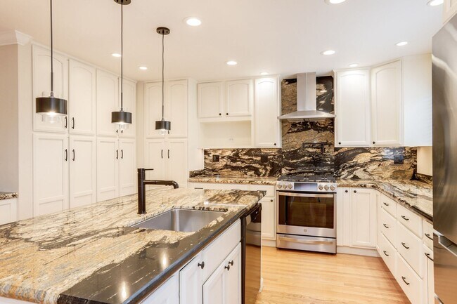 Building Photo - 4BR/3.5BA Belmont Home with Multiple Ensuite Bedrooms, A/C & 2-Car Garage | YouTube Tour