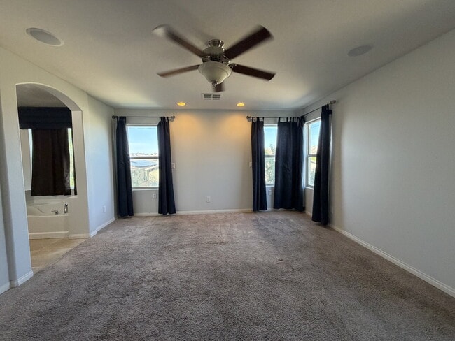 Building Photo - 4 BED 2.5 BATH 2 CAR GARAGE SINGLE FAMILY HOME W/ FULLY LANDSCAPED BACKYARD. THIS WAS FORMER MODE...