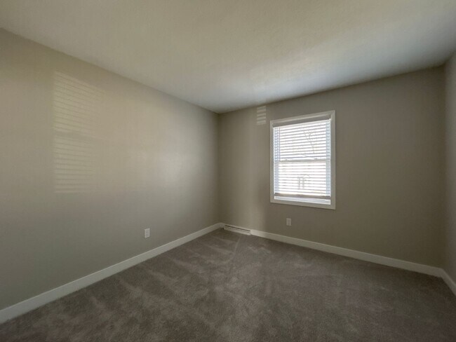 Building Photo - Beautifully Redone 3-Bedroom, 1.5-Bathroom Condo with Attached Garage – $1,725/Month (Lawn Care &...