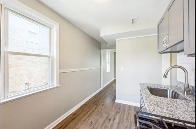 Building Photo - Fully Renovated Two-Bedroom Townhome In Du...