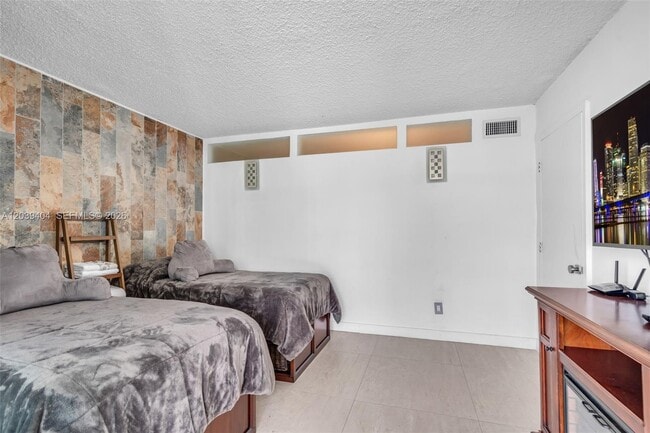 Building Photo - 5401 Collins Ave