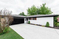 Building Photo - This complete remodel is centrally located...