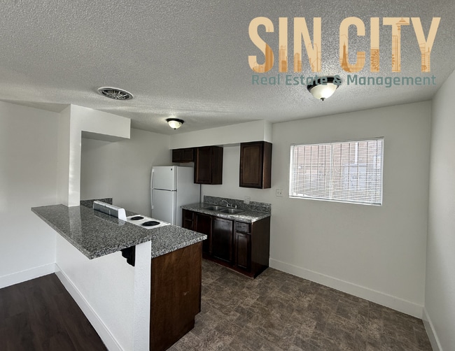 Building Photo - "Chic 1-Bed Oasis with Granite Elegance in Vibrant Las Vegas!"