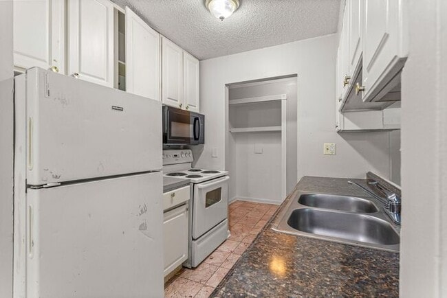 Building Photo - Heat and Water Included Clinton Township Condo - SECTION 8 Accepted