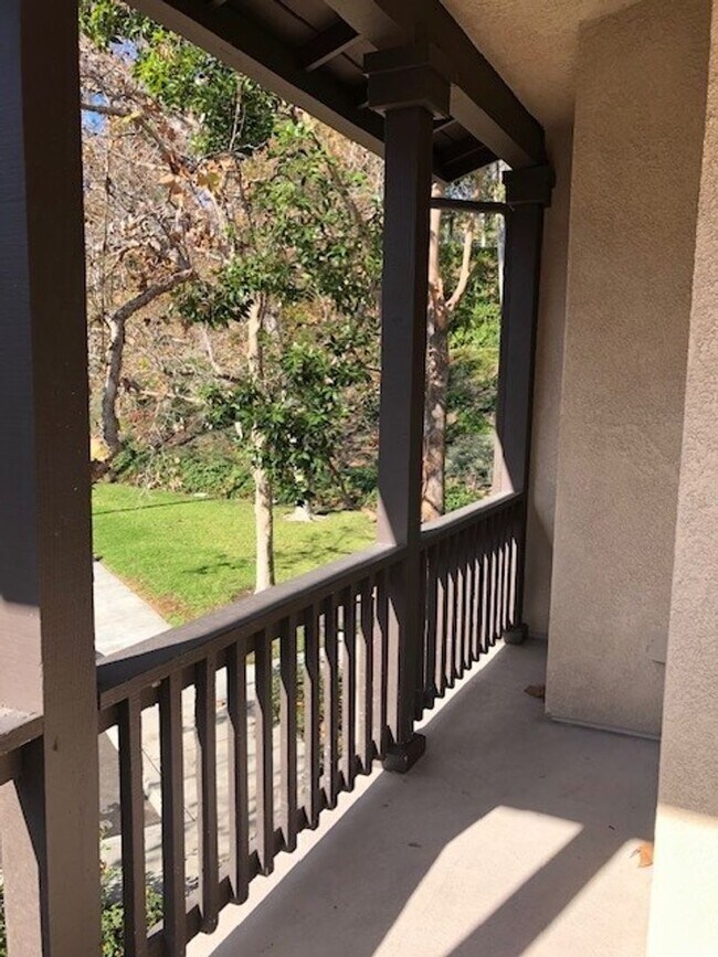 Building Photo - PICTURE PERFECT 2 BR/2 BATH PLUS LOFT END UNIT CONDO WITH DIRECT ACCESS 2 CAR GARAGE