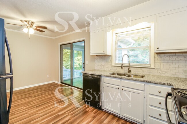 Building Photo - Enjoy living the good life in this 4 BR, 3 BA brick rancher